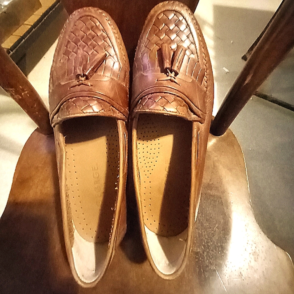 George Slip on with leather tassel. Worn once.
